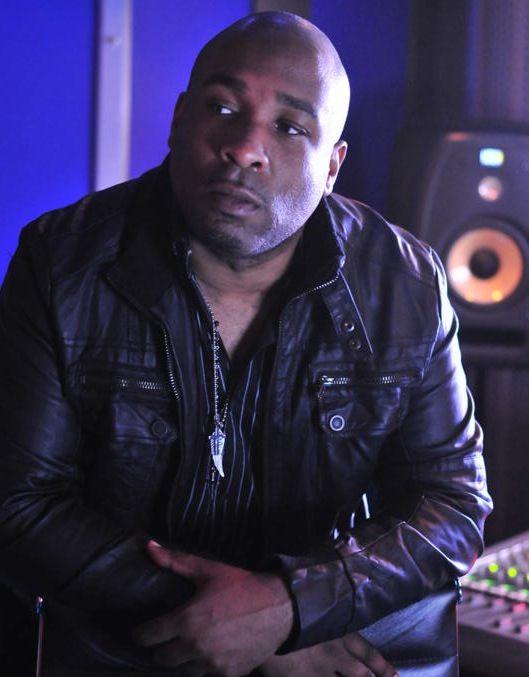 Chris Brown, founder of Maison Pearl, in a studio wearing a leather jacket